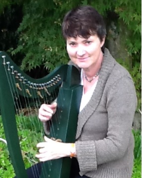 Sue playing the harp